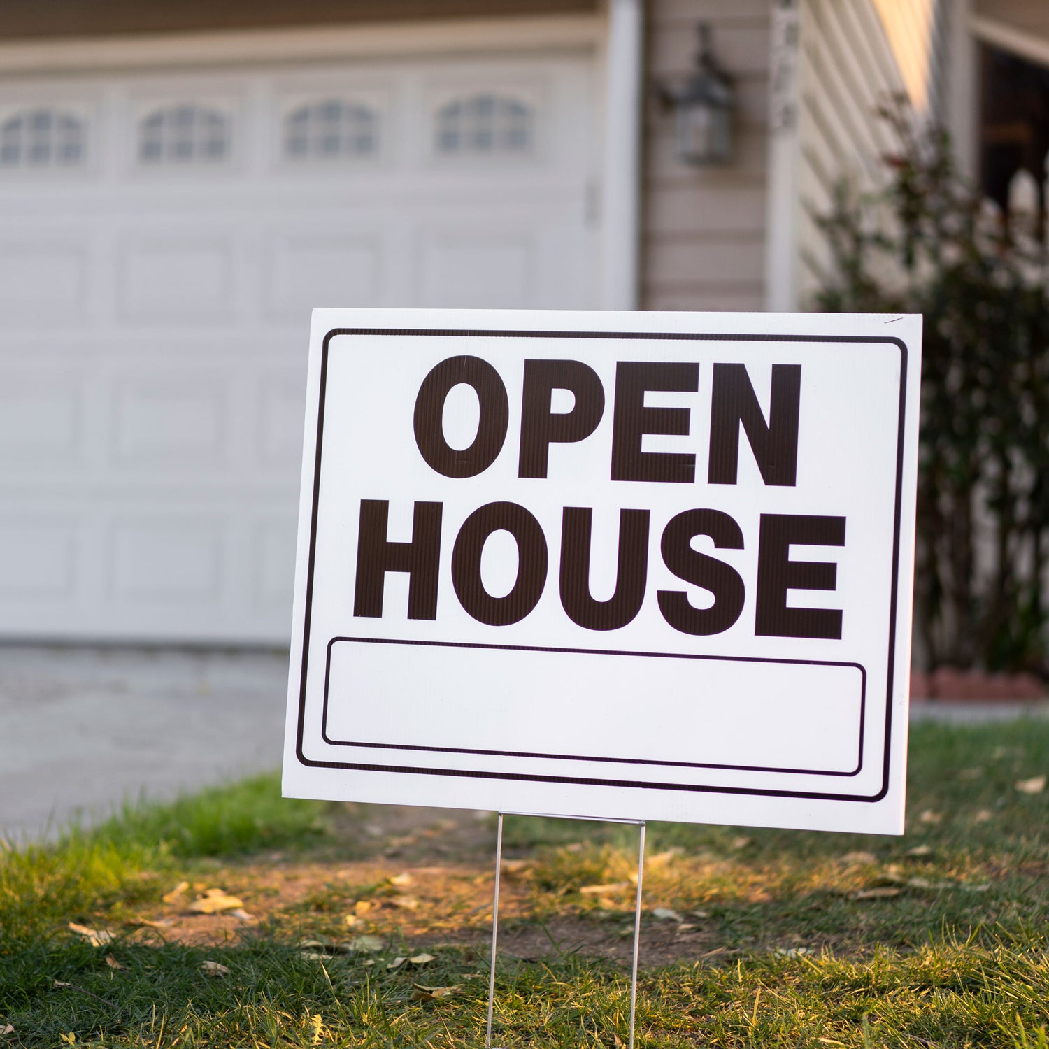 Image by Freepik. Open house coroplast step-stake lawn sign.